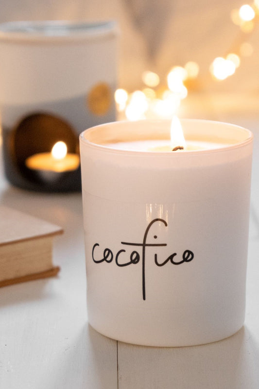 cocofico winter spice candle with monochrome wax melter in background
